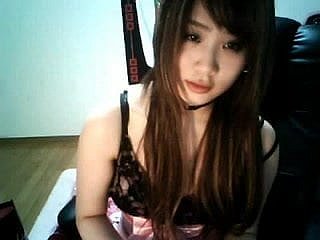 สาวเซ็กซี่บแคมจีนพยายามที่จะเจาะหัวนมของเธอเอง